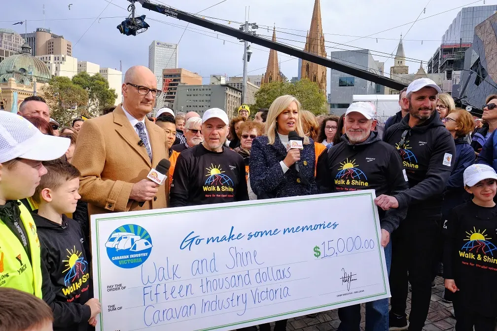 A fifteen thousand dollar cheque presented to Walk and Shine